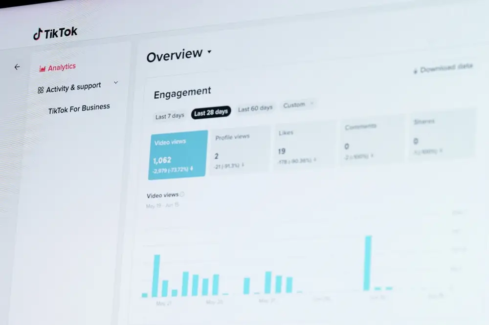 TikTok Analytics engagement menu close up on laptop screen