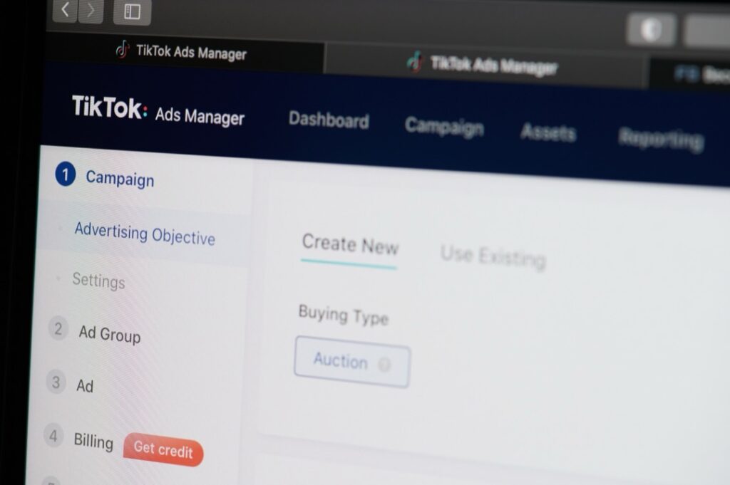 Managing ad campaign in tiktok page screen display close up view