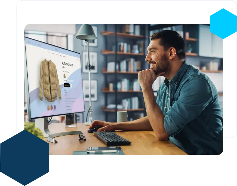 Handsome Caucasian Specialist Using Desktop Computer with Clothing Online Web Store