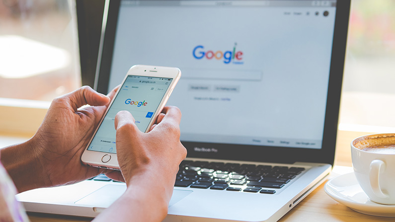 Bangkok. Thailand. January 24, 2016:A woman is typing on Google search engine from a laptop. Google is the biggest Internet search engine in the world.