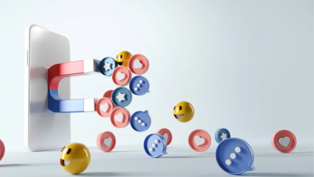 Mobile phone attracting social icons with magnets, representing a high-converting lead magnet on social media.