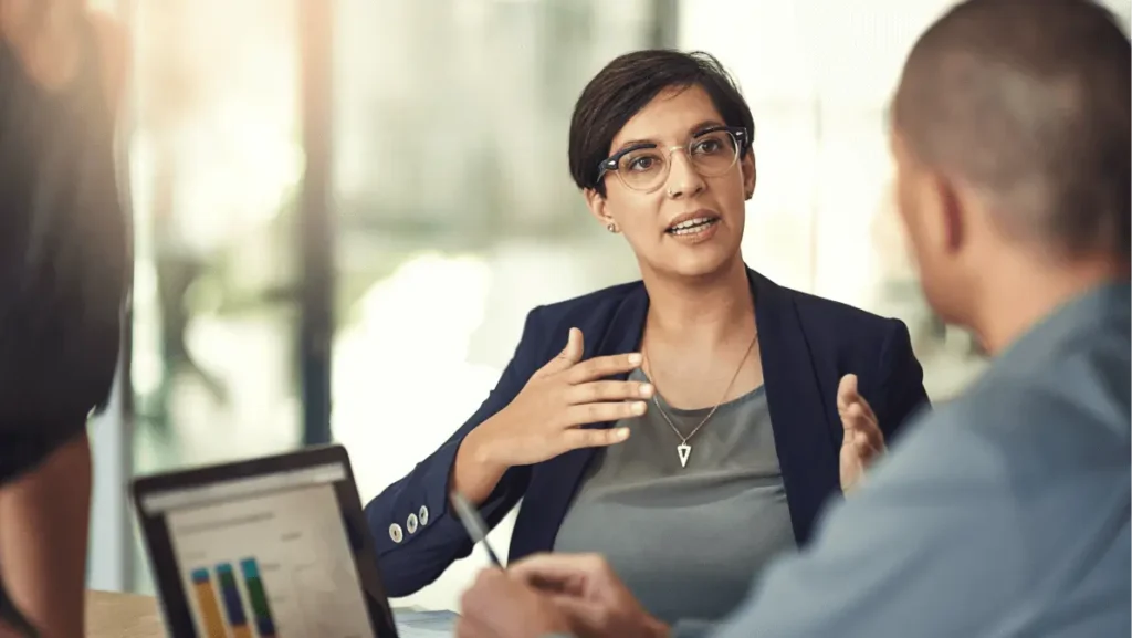 Laptop screen, graphs and business woman for data analysis meeting, financial report or b2b advice for revenue.