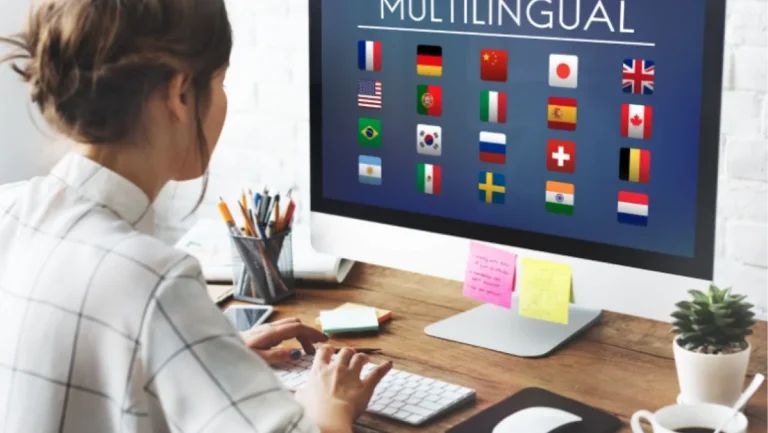 A woman in her computer, with different country flags