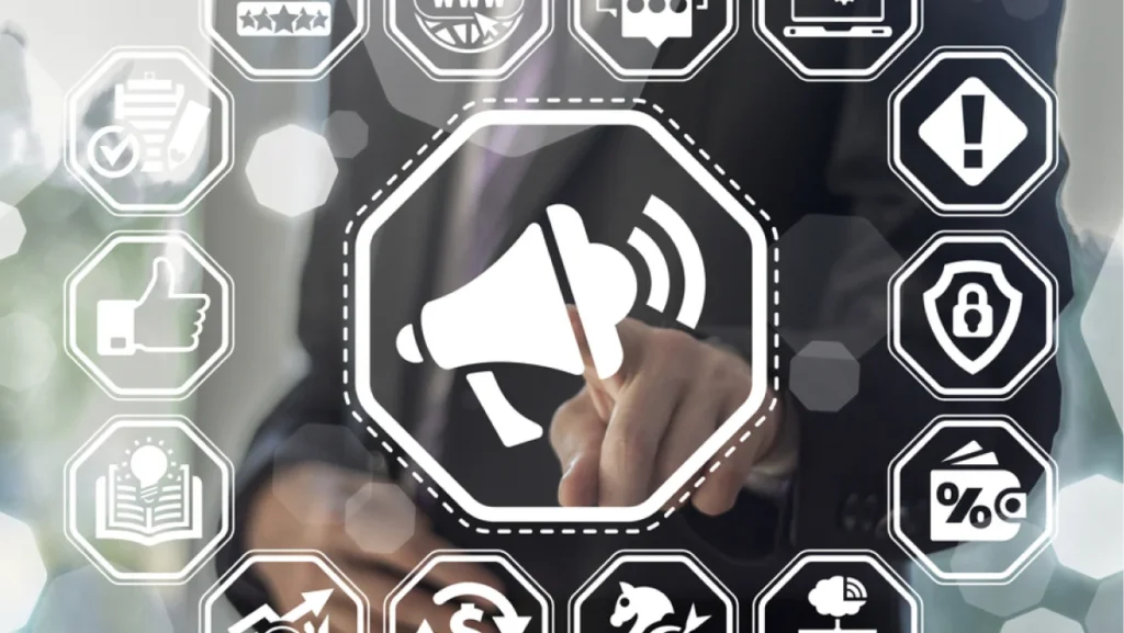 Man presses loudspeaker on a virtual graphical user interface.