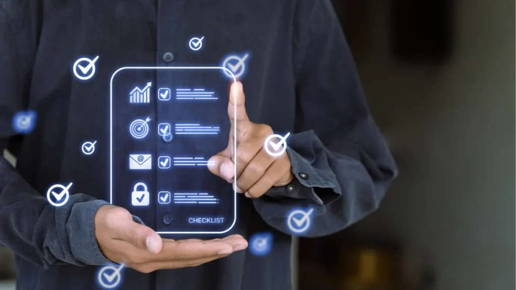 A person in a dark shirt interacting with a digital checklist interface projected in front of them.