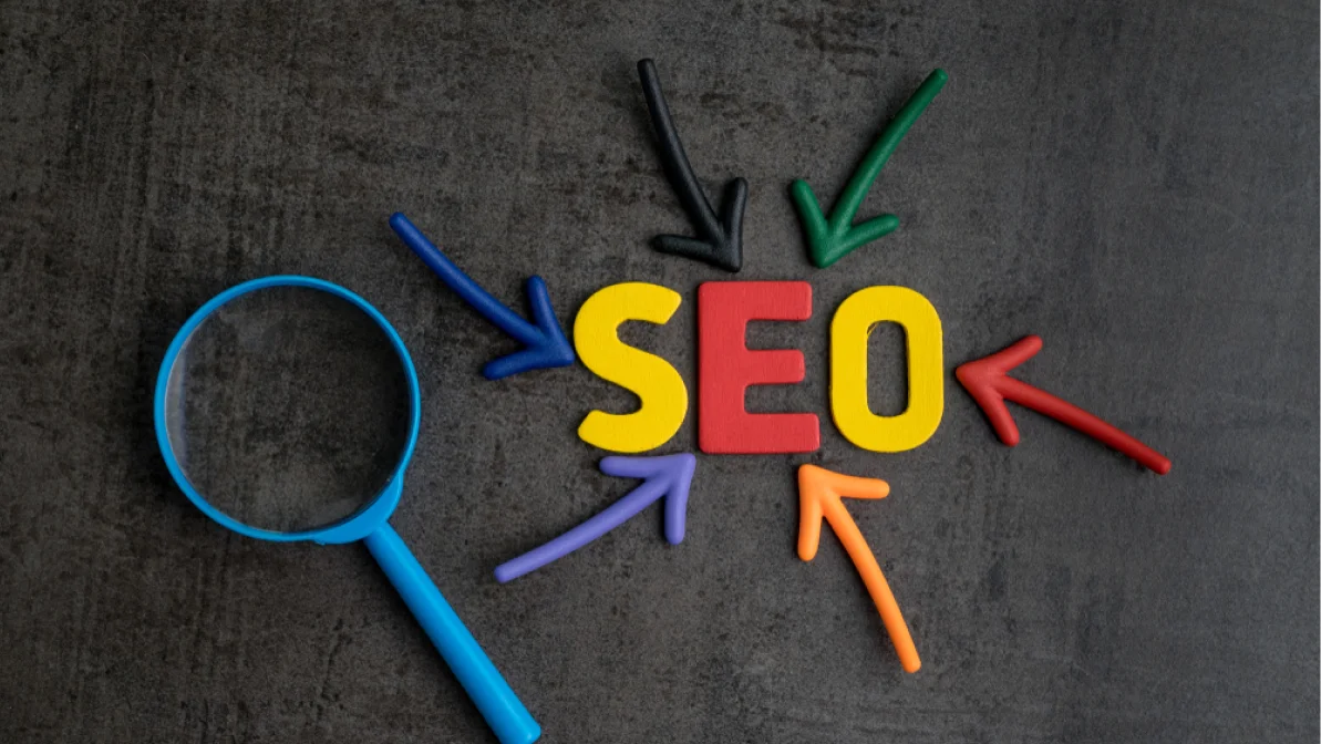 SEO, Search Engine Optimization ranking concept, magnifying glass with arrows pointing to alphabets abbreviation SEO at the center of cement wall chalkboard, the idea of promote traffic to website.