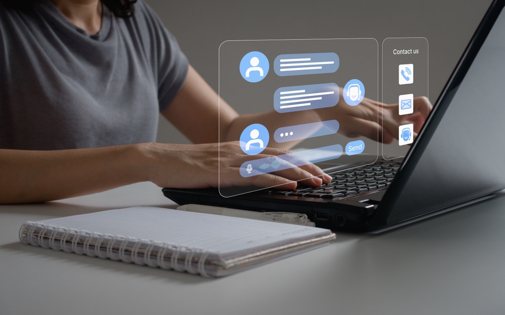 Contact us, Chatbot conversation assistant. Businesswoman using online client service with chatbot to get support.