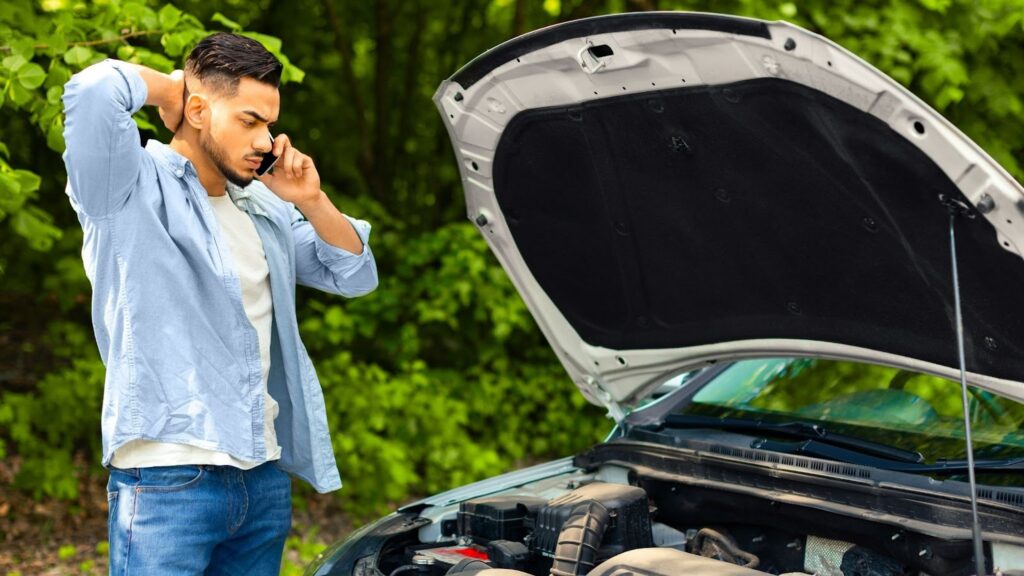 man calling an auto repair