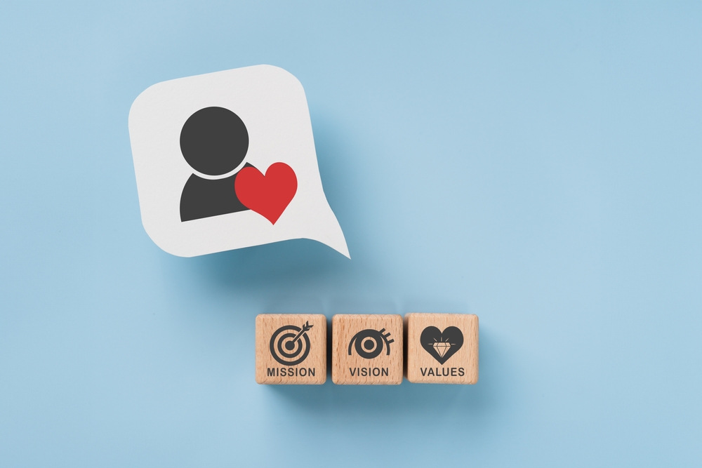 vision, mission, values text and icon on wooden cube