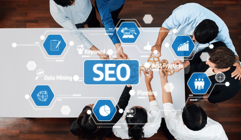 A team collaborates on effective SEO strategies while utilizing data mining and best practices