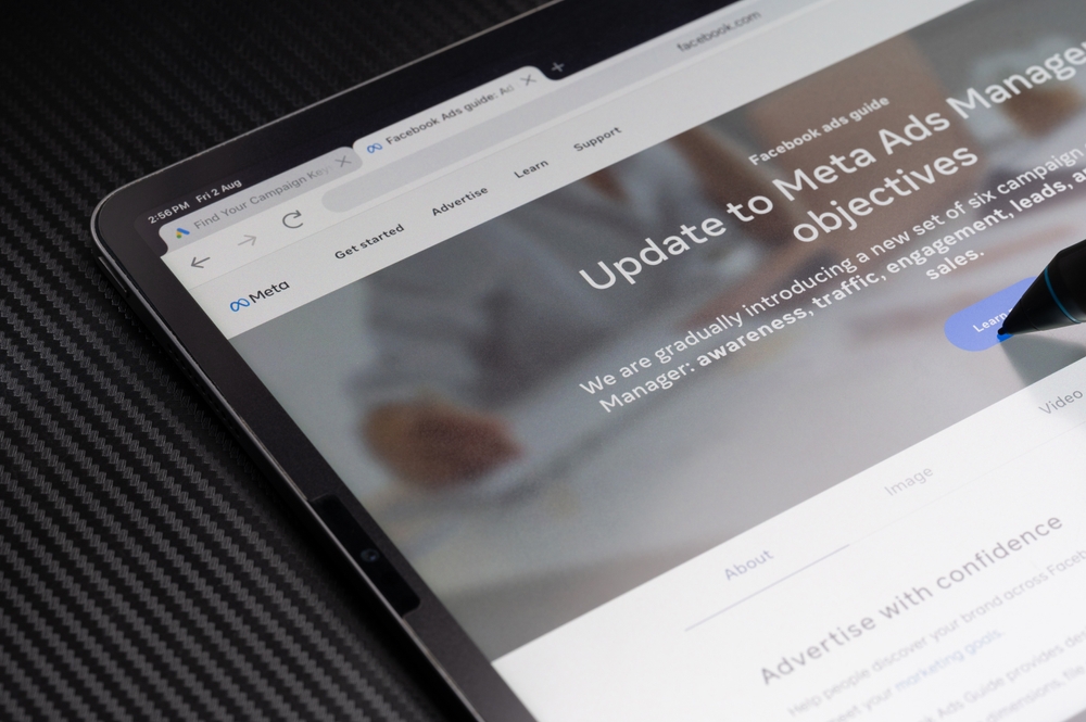 Facebook ads guide on tablet screen macro close up view