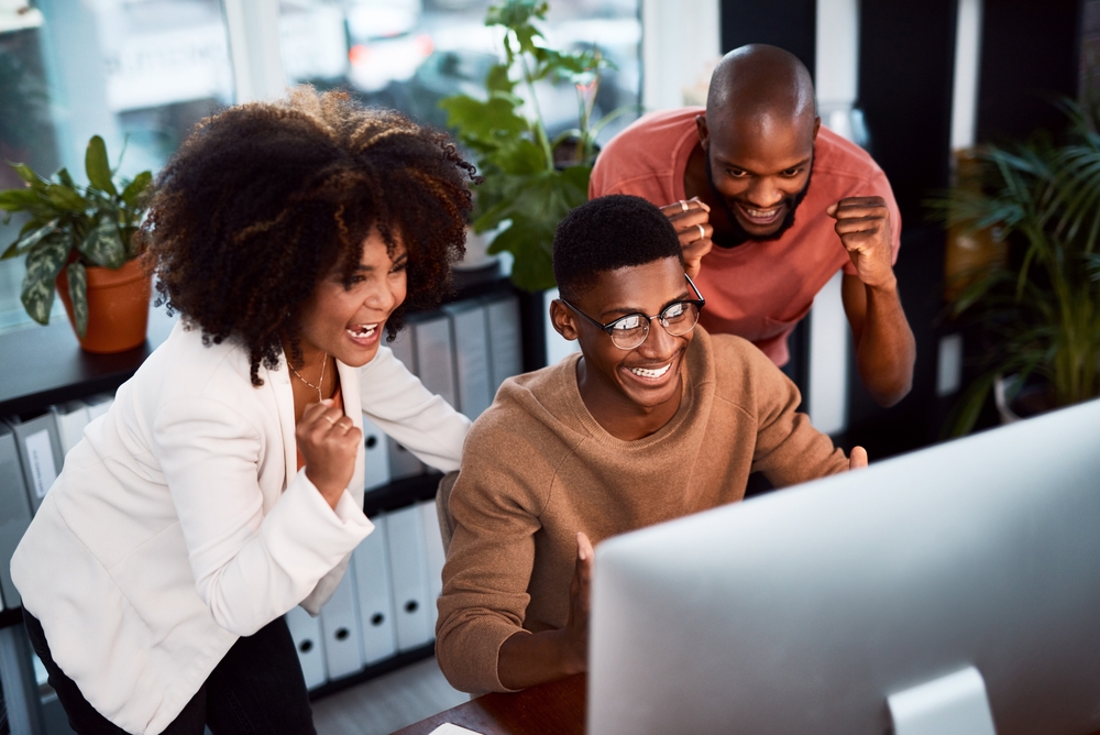 Computer, news and success with business people for email marketing