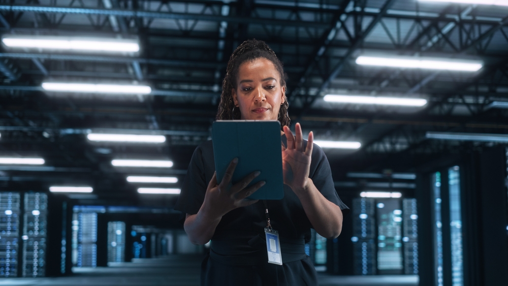 Mature Businesswoman Working with Tablet Computer in Her Office