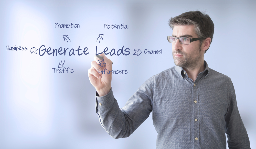 businessman with generate leads diagram