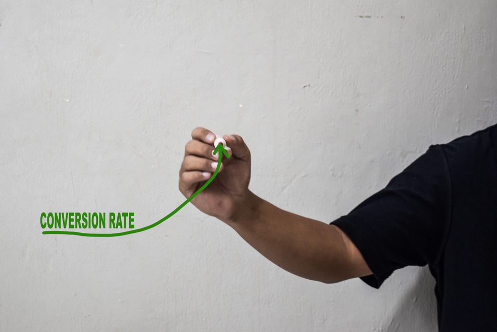 Businessman draw growing line symbolize conversion rate