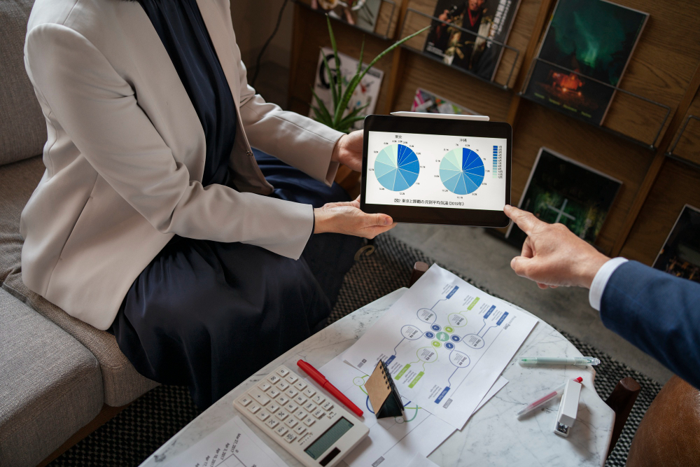 Business people working with ipad high angle