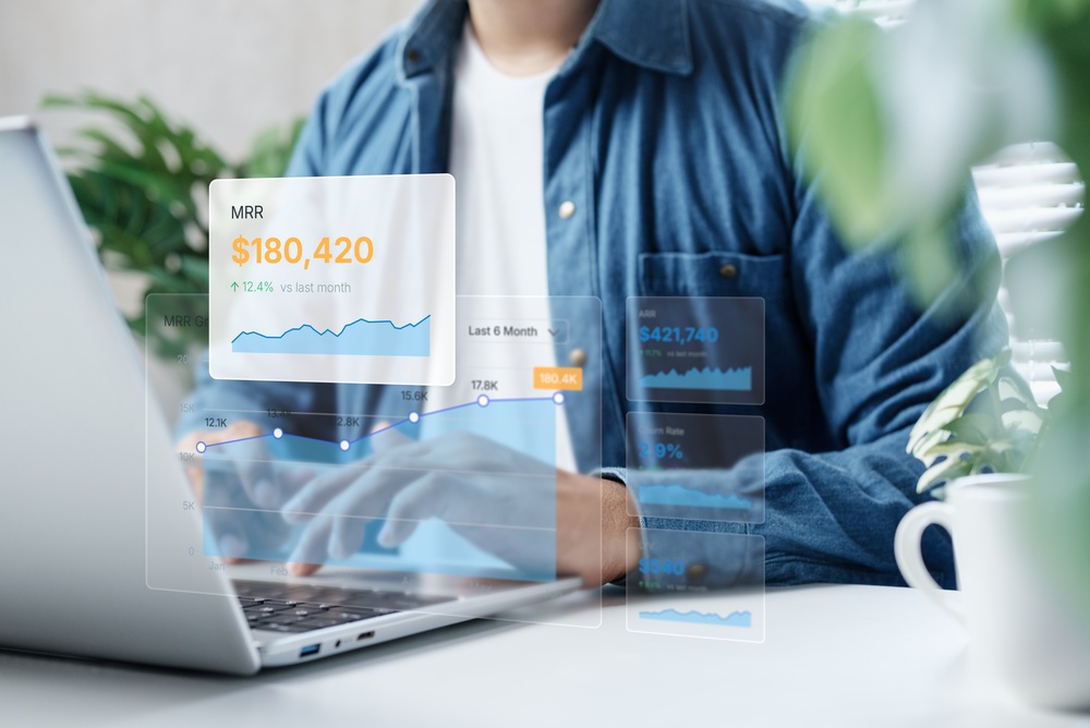 Business analytics dashboard overlay showing MRR growth