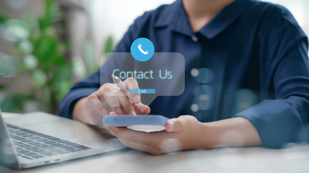The Contact Us button on the mobile screen is for customer support interaction.