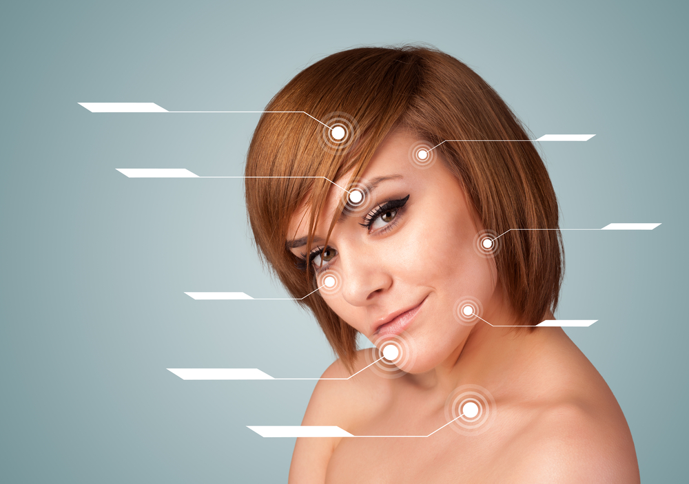Young sexy girl with facial treatment modern arrows on gradient background
