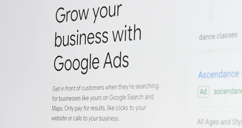New york, USA - april 8, 2019: Grow business with google ads on digital screen macro close up view