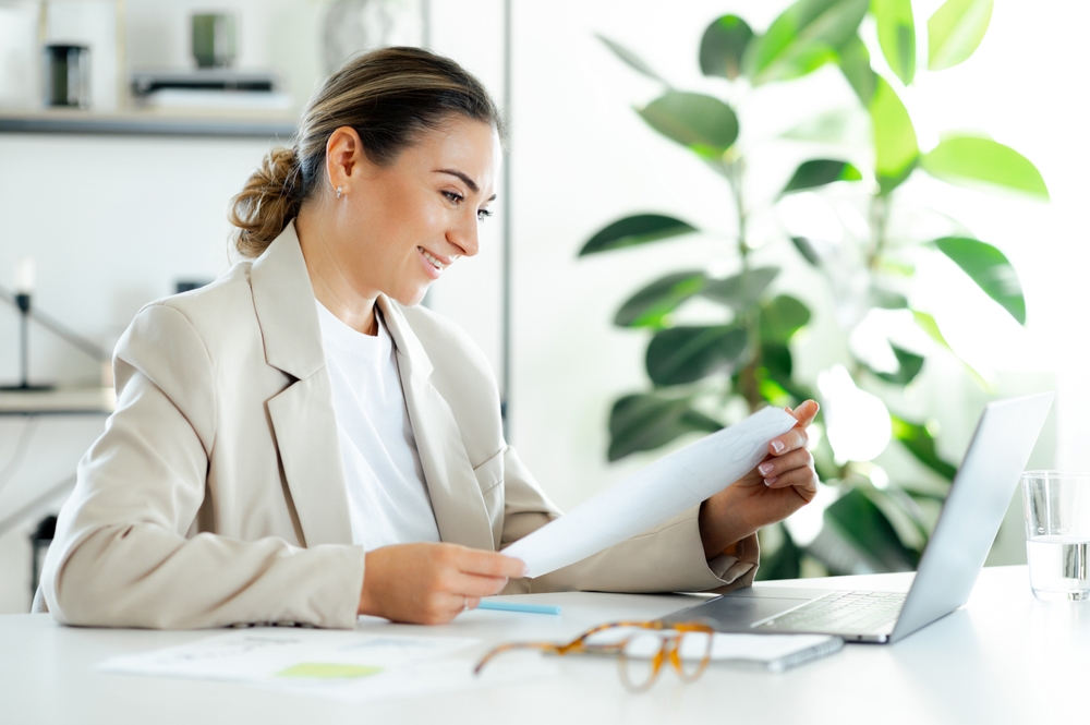 Positive confident caucasian businesswoman, company financial manager