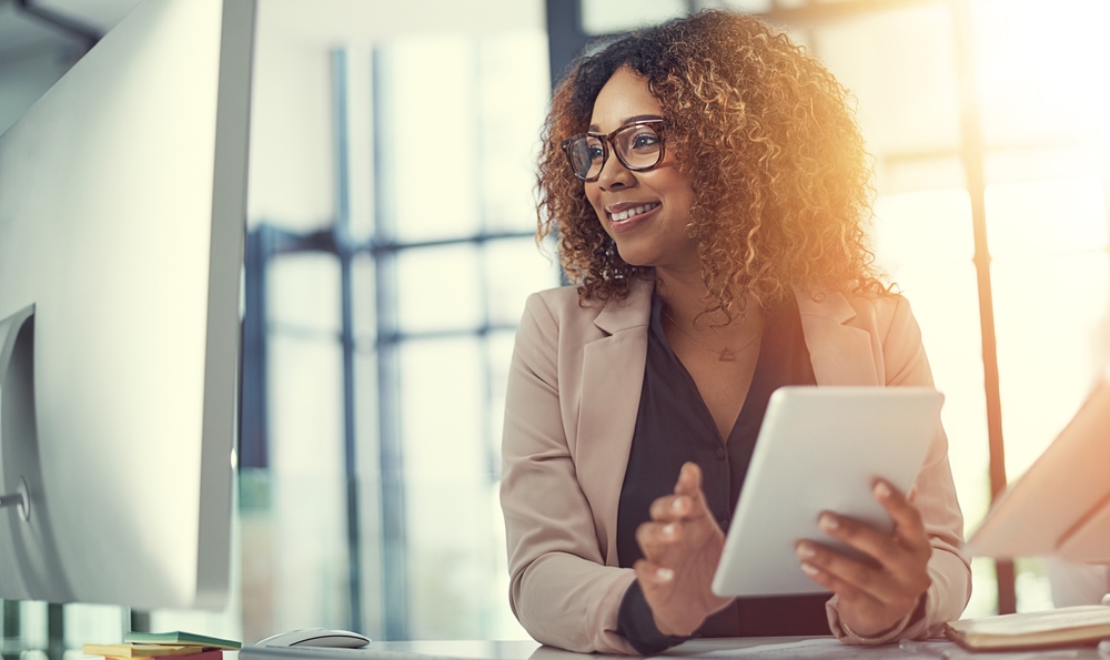 Real estate agent, computer or businesswoman in office for research, online opportunity or listing services
