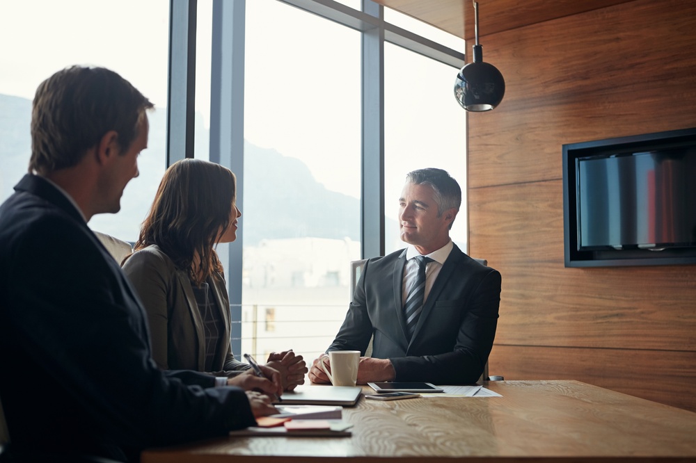 Business, men and woman in office for legal advice, consultation or corporate negotiation with attorney.
