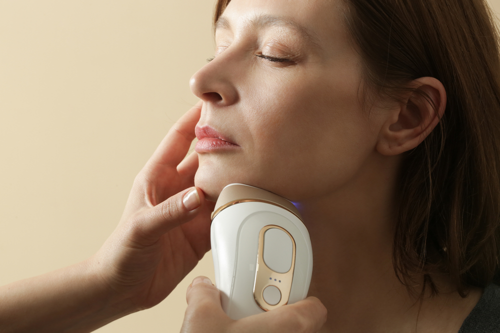 Facial laser epilation treatment. Skin care, beauty and permanent hair removal concept.