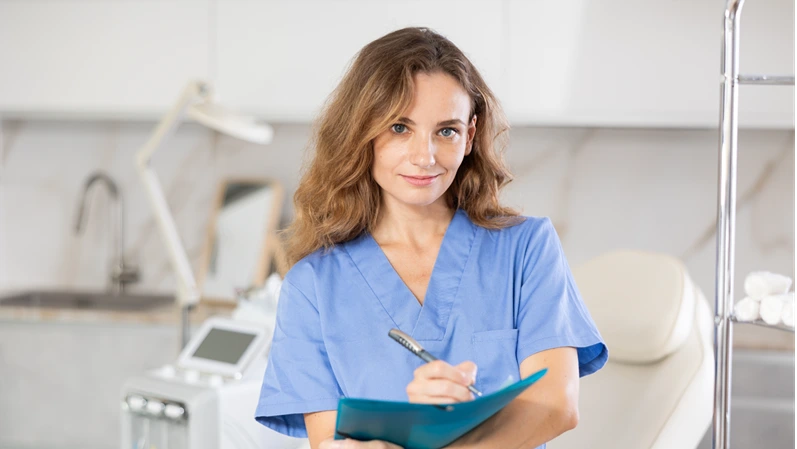 In her meticulously organized clinic, female cosmetic doctor attentively reviews patient's medical records, her face displaying caring and professional demeanor.