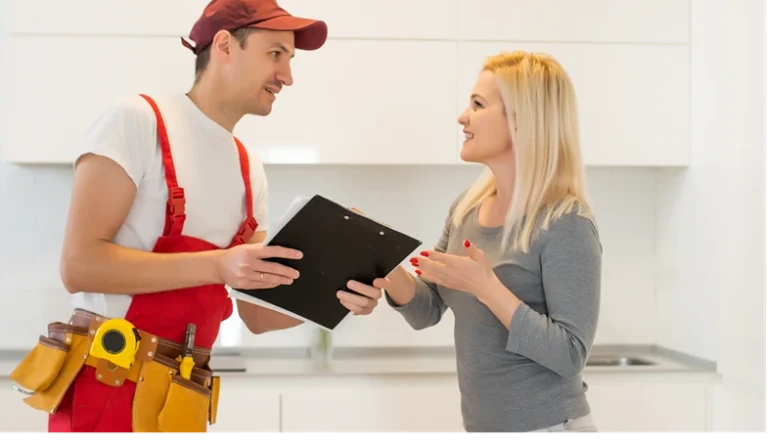 a washing machine repair service with female customer