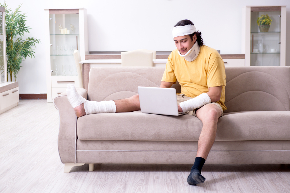 Young man after accident recovering at home 