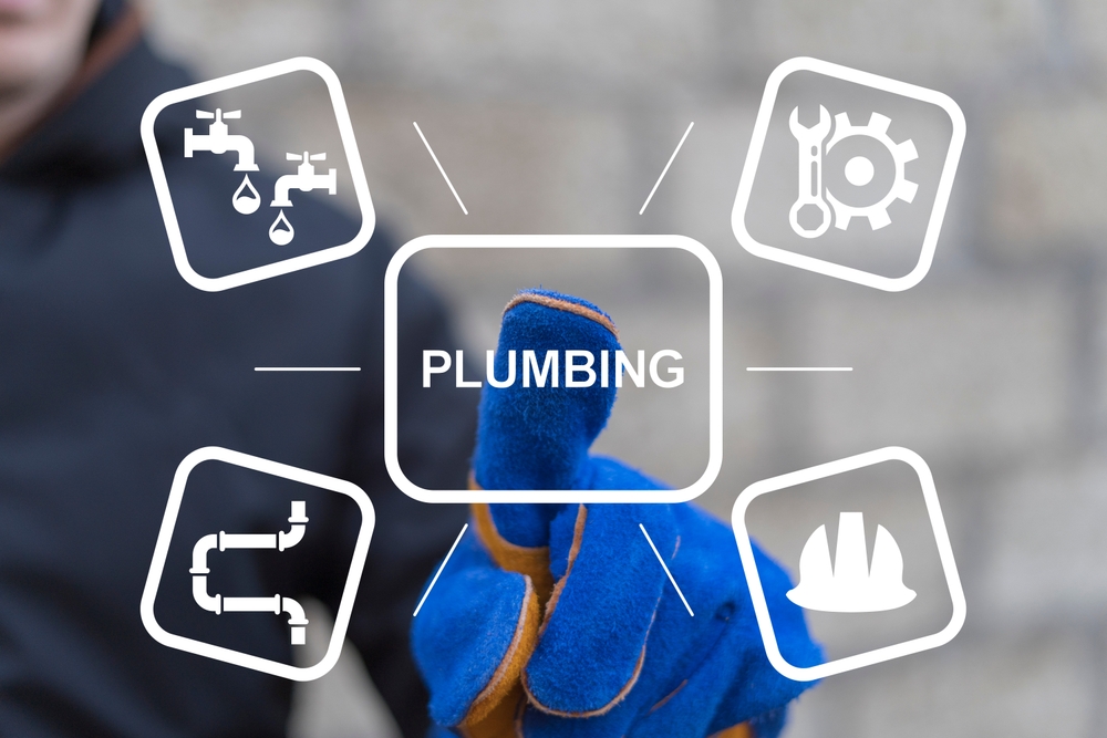Technician plumber using virtual touchscreen presses word: