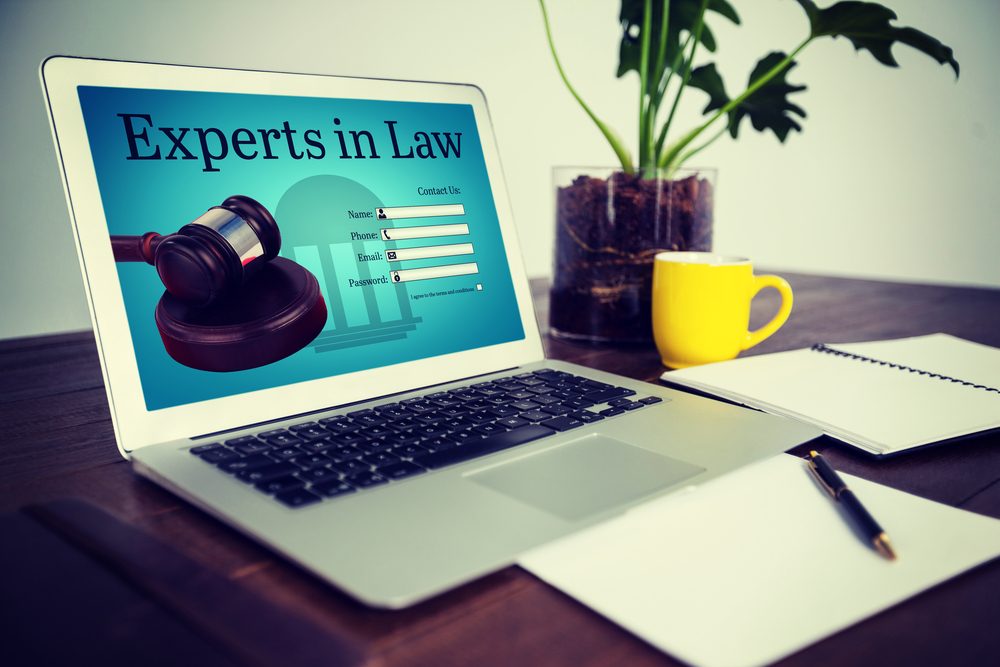 Graphic interface of lawyer contact form  against office desk with laptop and documents
